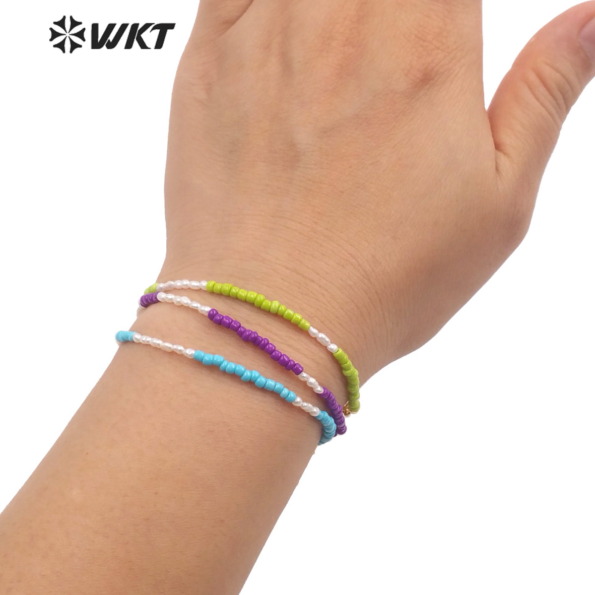 WT-MPB079 Women Elegant Tiny 2 - Ceramic Link Bracelet review and price